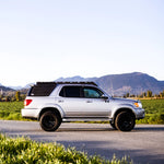 1rst gen Toyota Sequoia with a roof rack