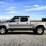 2nd gen Toyota Tacoma with a roof rack for l'overlanding
