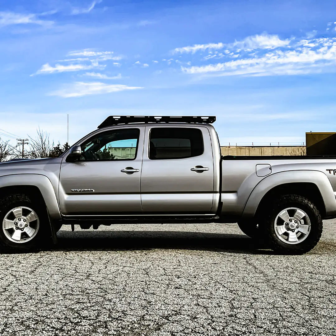 2nd gen Toyota Tacoma with a roof rack for l'overlanding