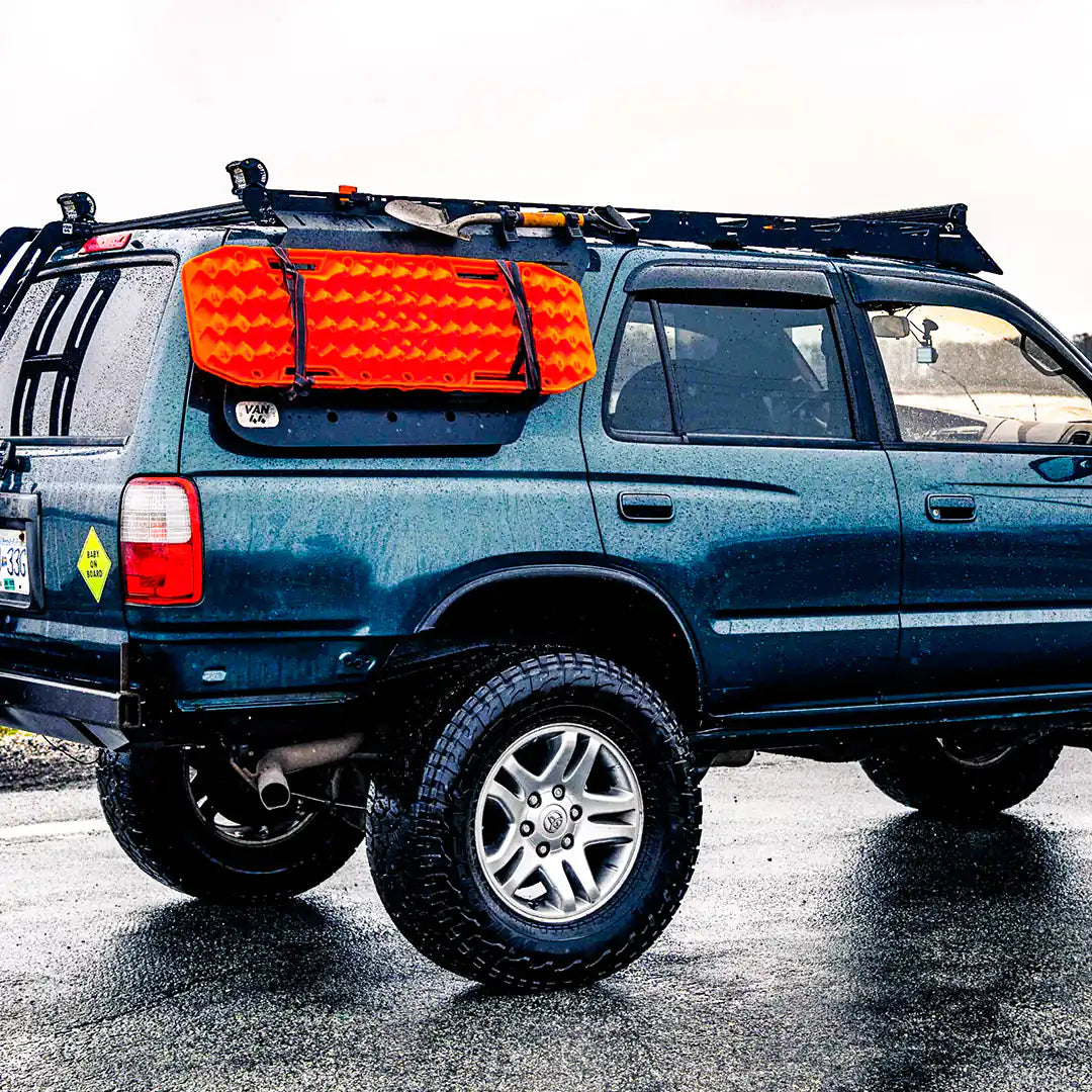 Side view with shovel and traction board