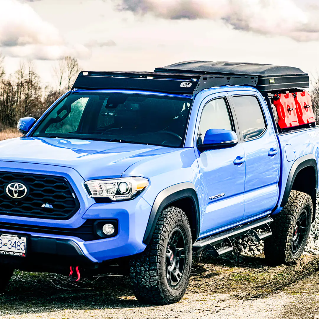 Large view with overland gear, as roof top tent and rotopax gas can