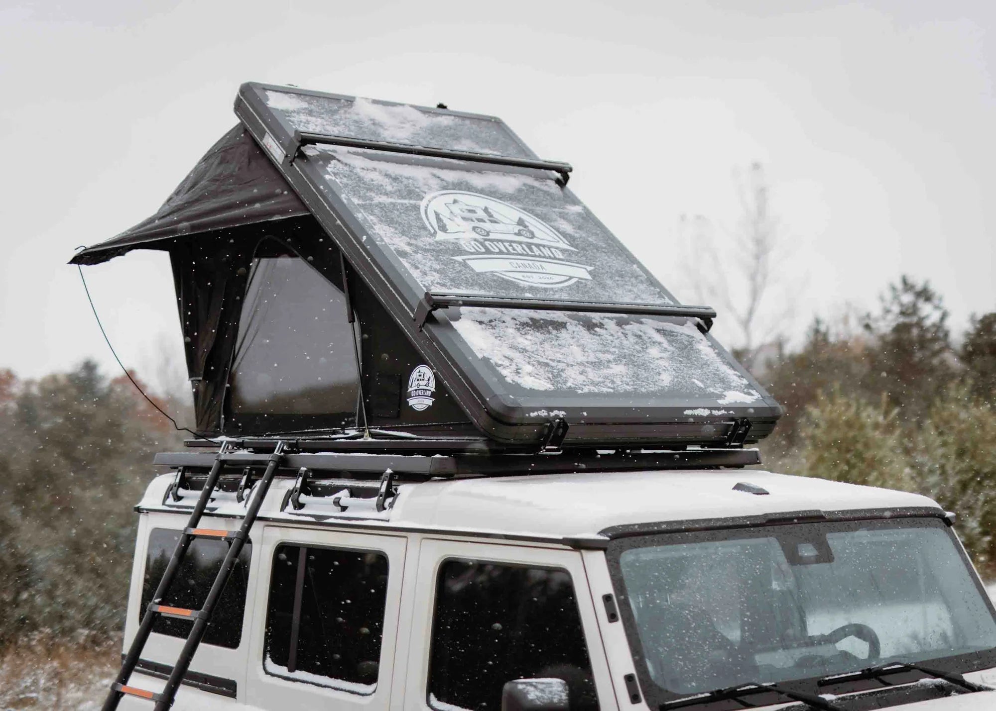 Front view of the ultra light roof top tent under the snow