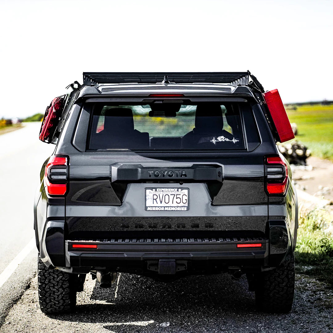 2025 Toyota 4runner with a roof rack and and overland organizer on the side panel mount