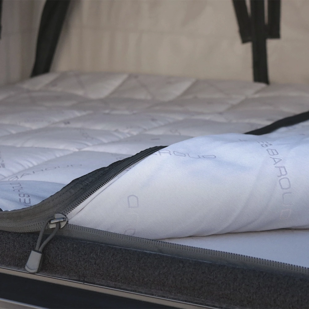 Opening the zip of the bedding system for roof top tent by james baroud