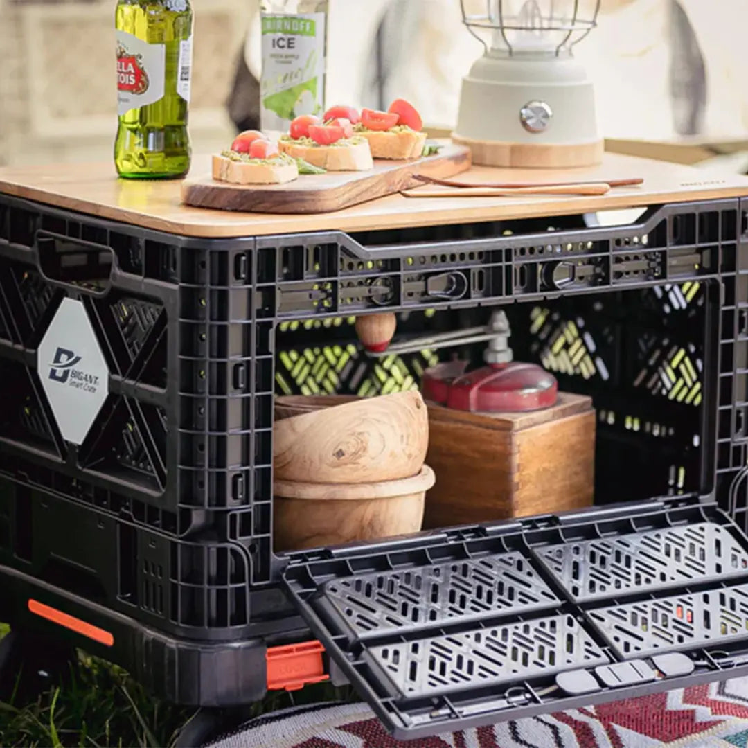 Close view of the crate with food and camping accessories