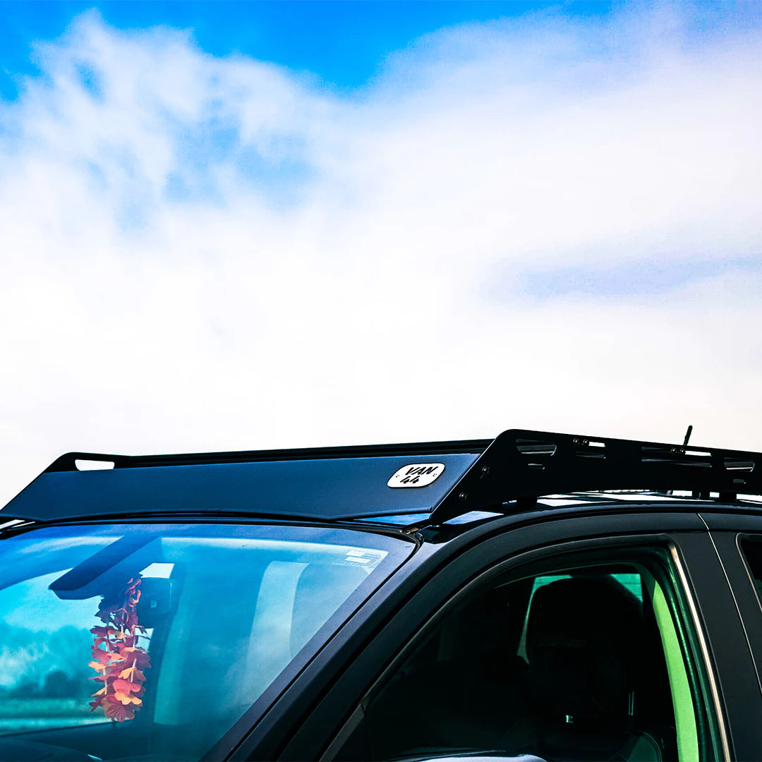 Front view with logo and blue sky