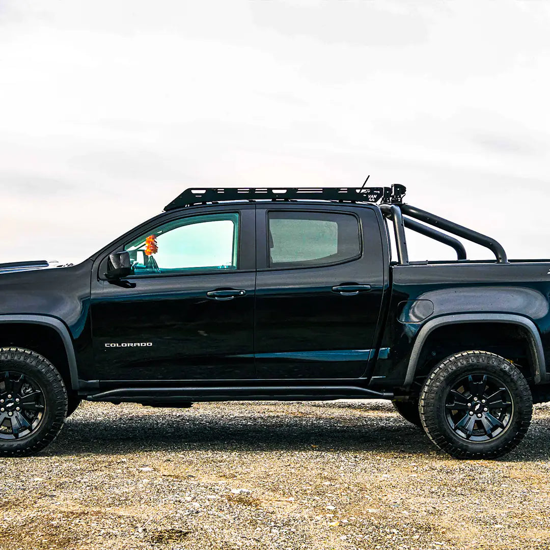 2nd gen Chevy Colorado with a Roof Rack, and a back rack ready for overland