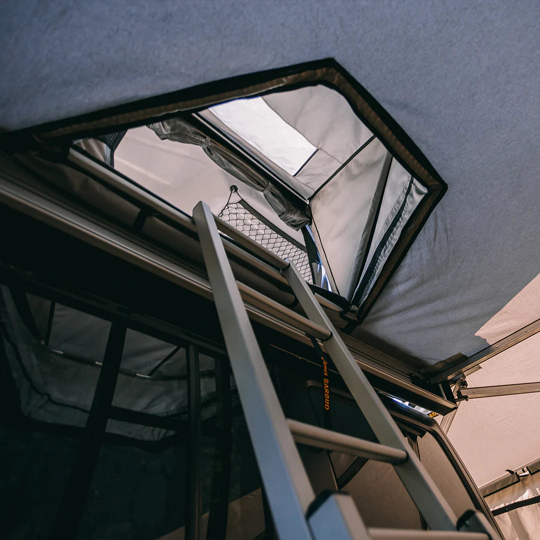 From bottom, view of the rooftop tent through the tunnel