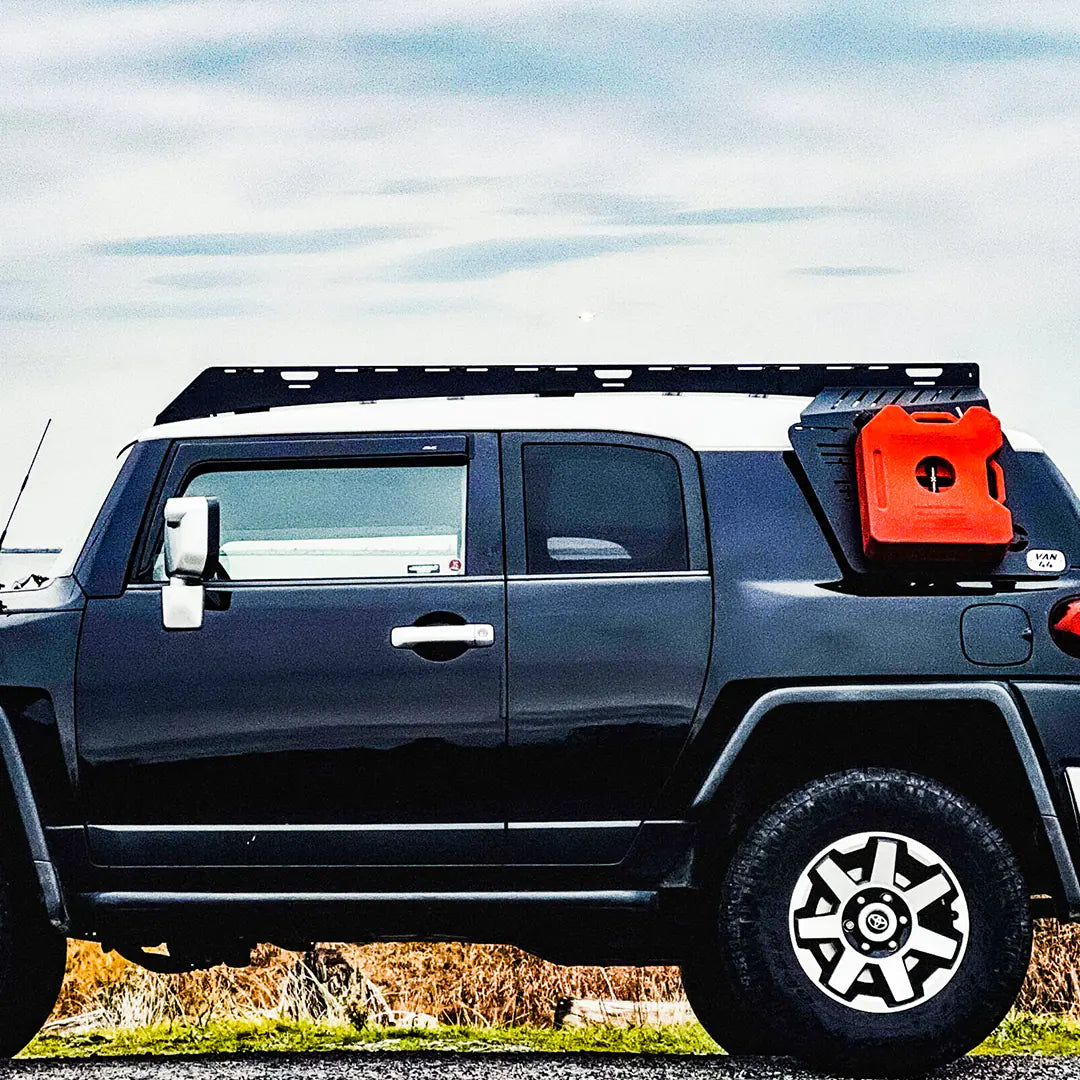 Overland Gear on organizer on the side of the roof rack on a toyota fj cruiser