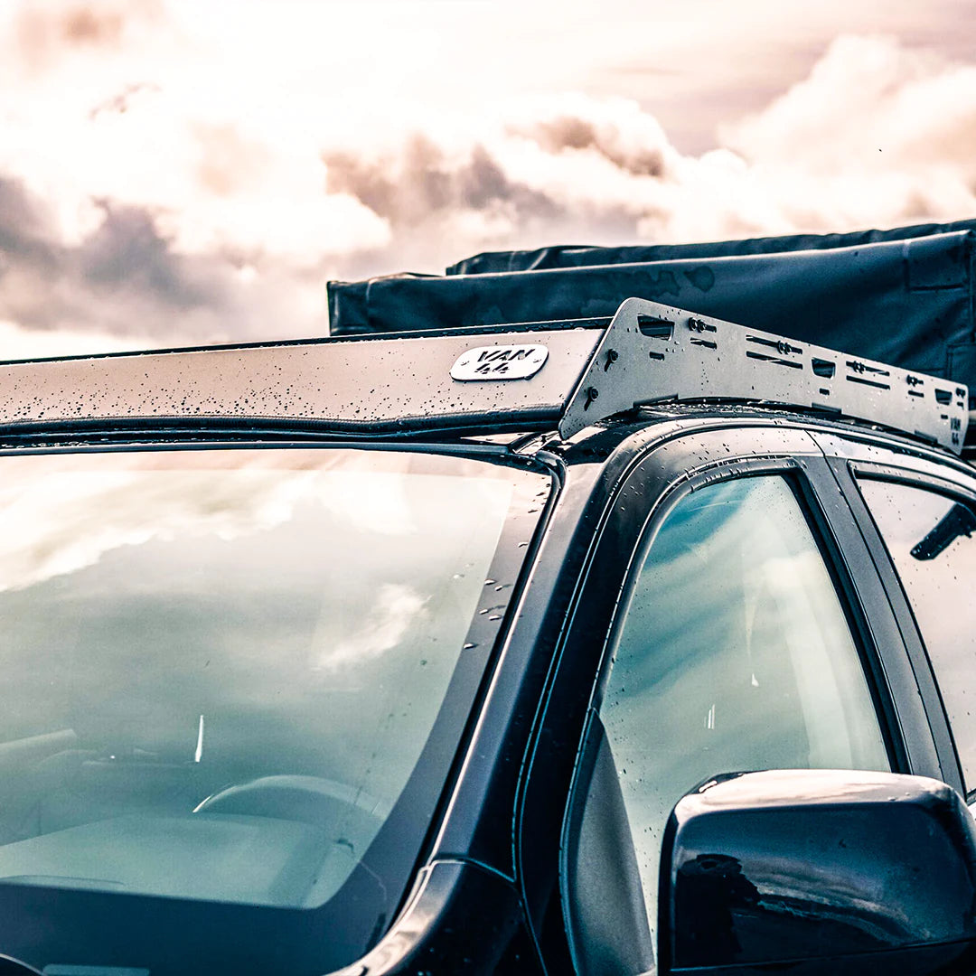Front view of the GMC Canyon roof rack made in canada by VAN44 and a roof top tent on the back