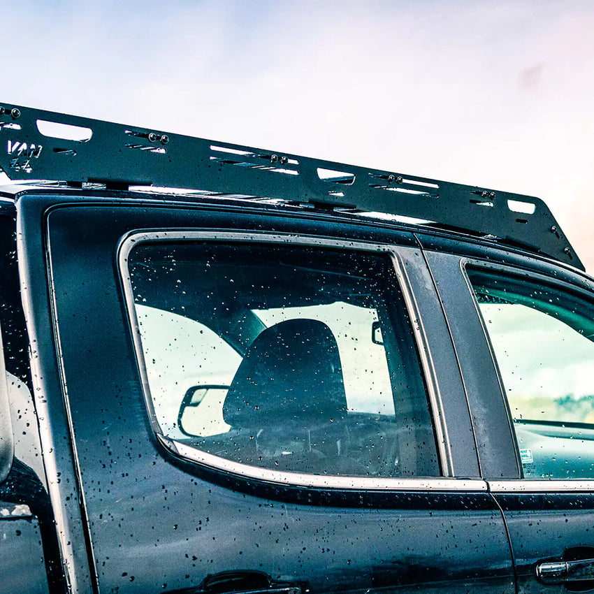 Side view of the roof rack cargo carrier for overland on this gmc canyon 2nd gen