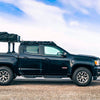 GMC Canyon with a roof rack and a roof top tent