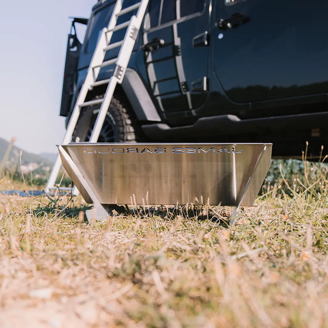 View on the side of a jeep with a rooftop tent
