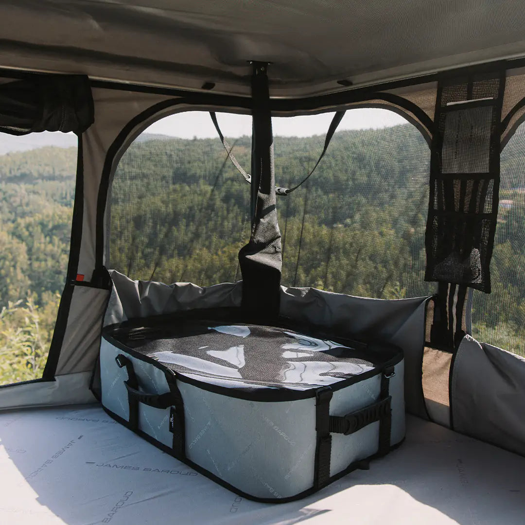 Storage box in a rooftop tent