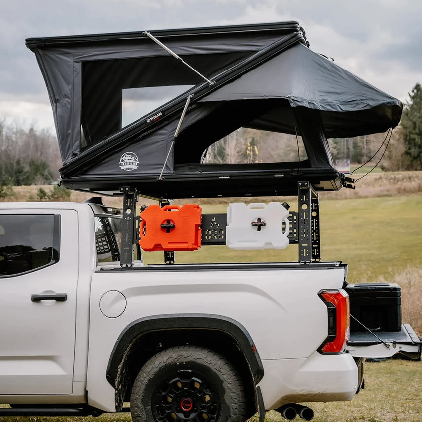 Vie from side and opened large roof tent