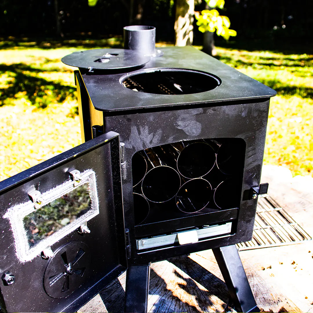 Front view with pipes inside, Tiny wood stove easy to move in van or camping