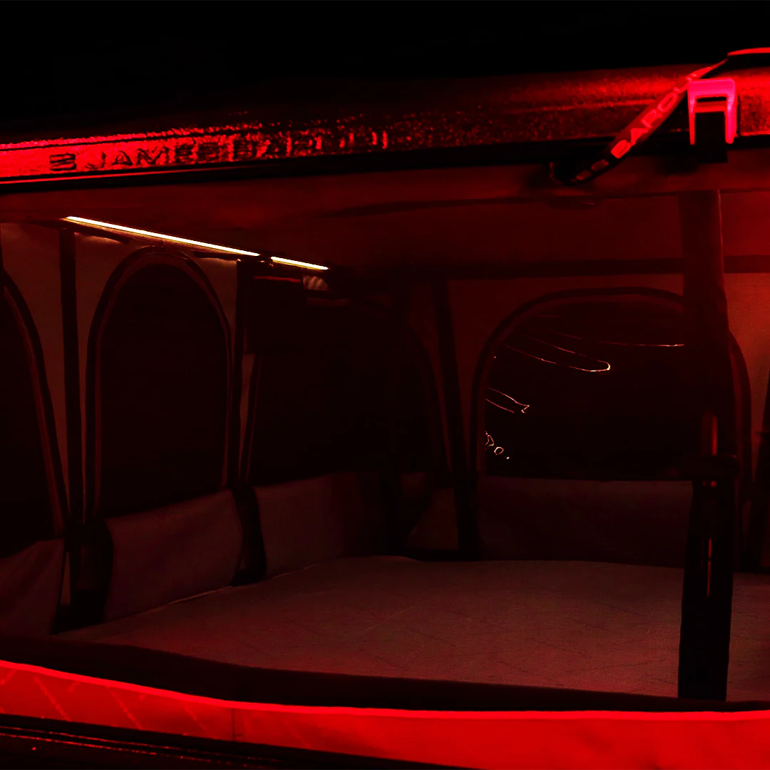 View of the pop up roof top tent with red lights