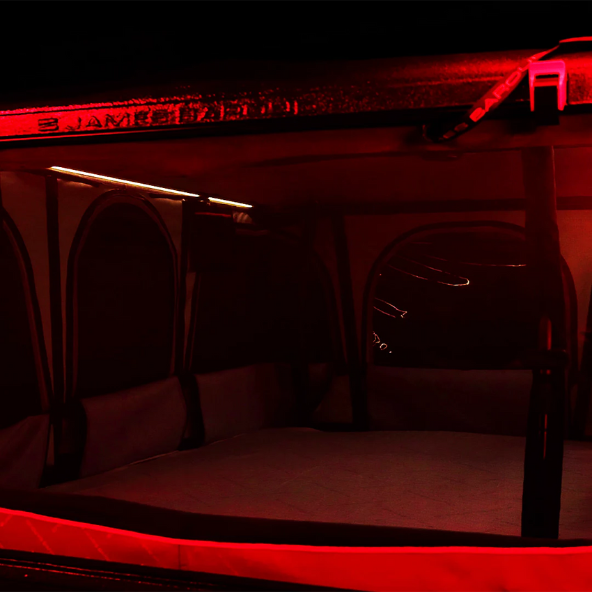 View of the pop up roof top tent with red lights