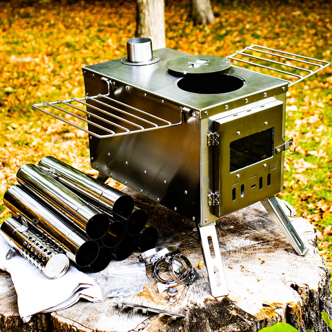 Large view of the portable camping wood stove with pipes and parts