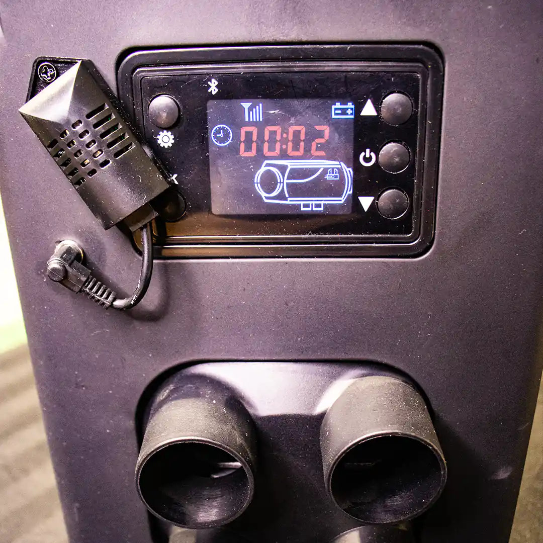 Portable Diesel Heater for Tent turned on with LCD screen and remote controller