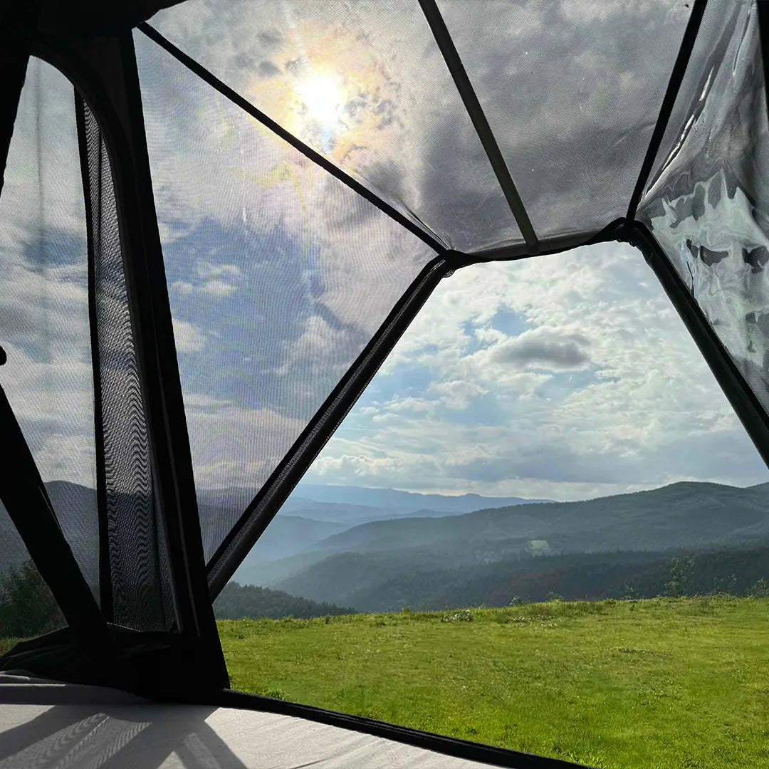 Large view from the inside of the rooftop tent with a rain shade