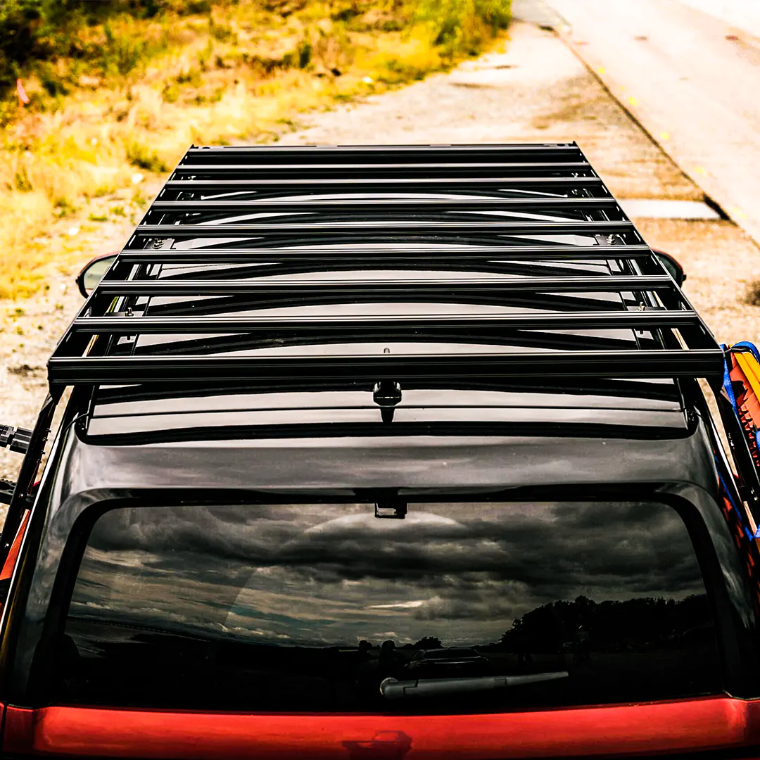 Top view of the 9 Crossbars on the roof top of a Rivian Roof Rack