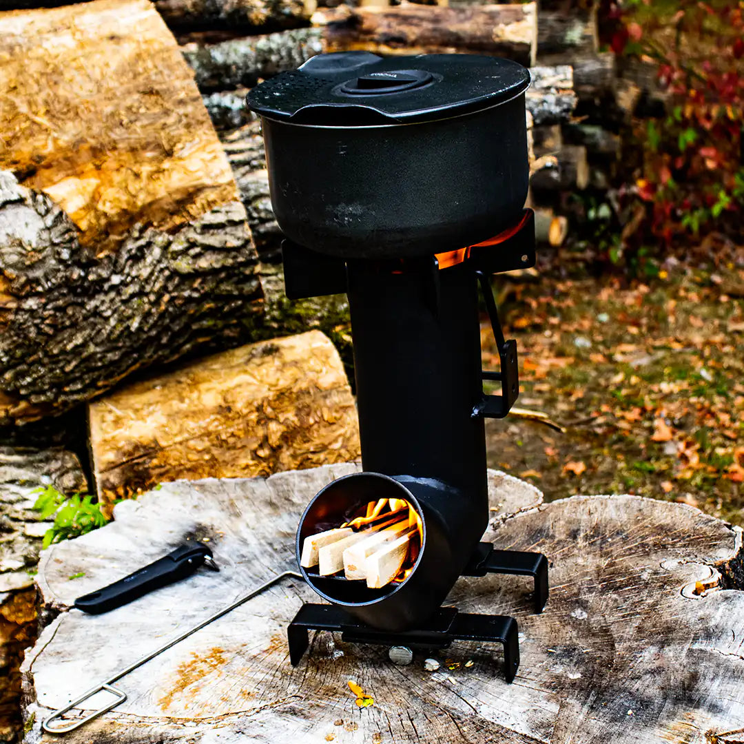 View of the rocket Stove burning wood