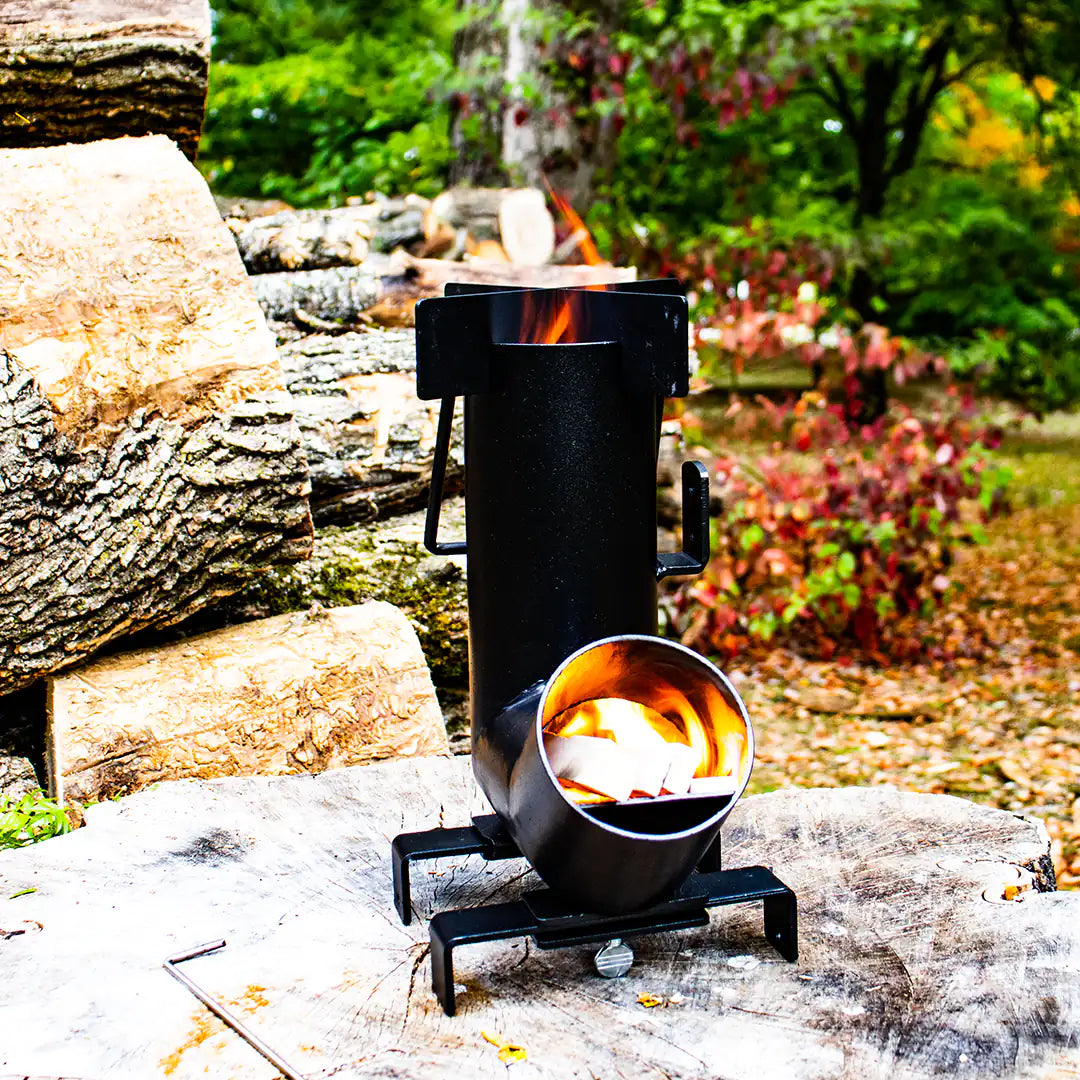 View of the Camping wood burner with wood fire