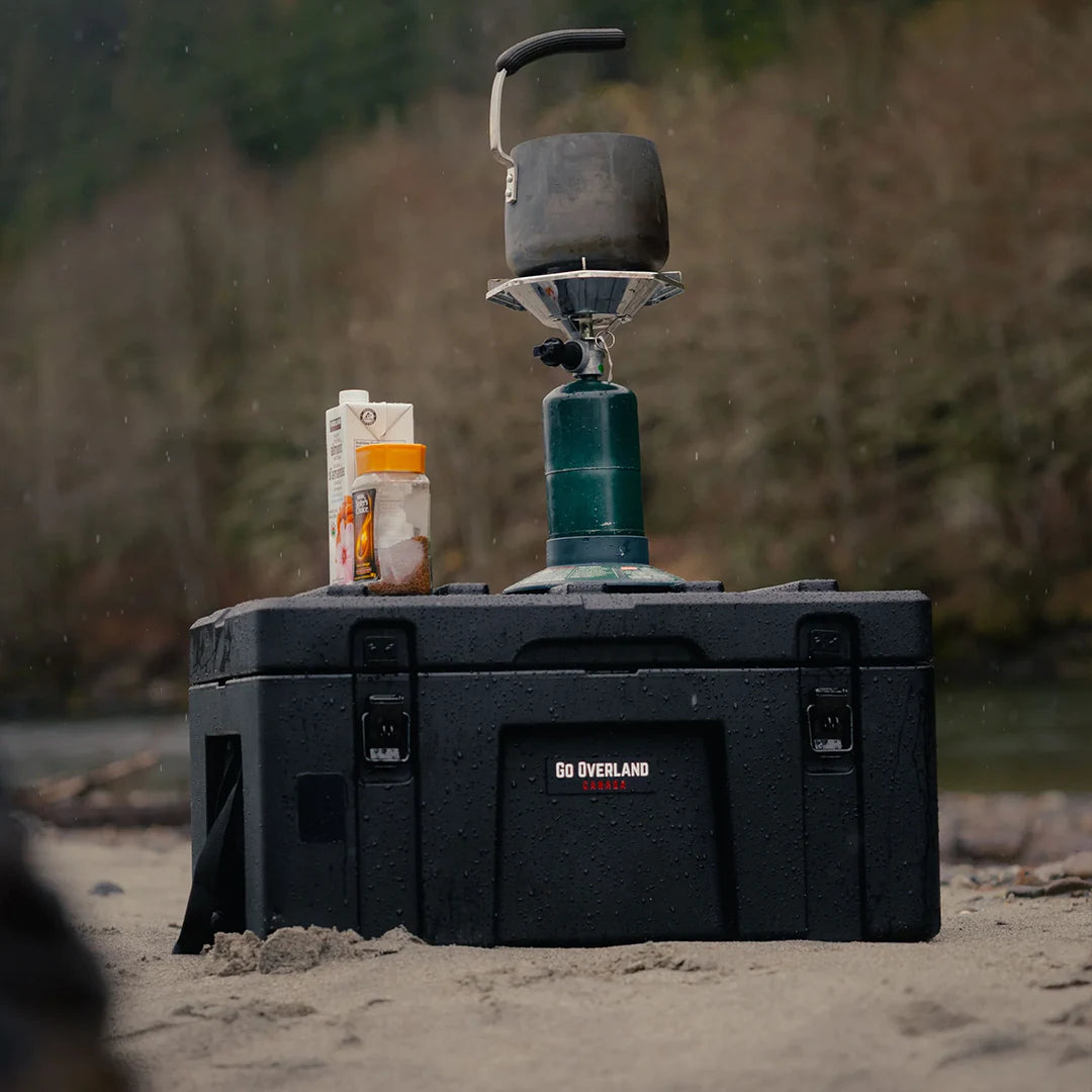 Camping with stove on the sand near the beach