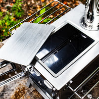 View of the top open for cooking on the tiny wood stove