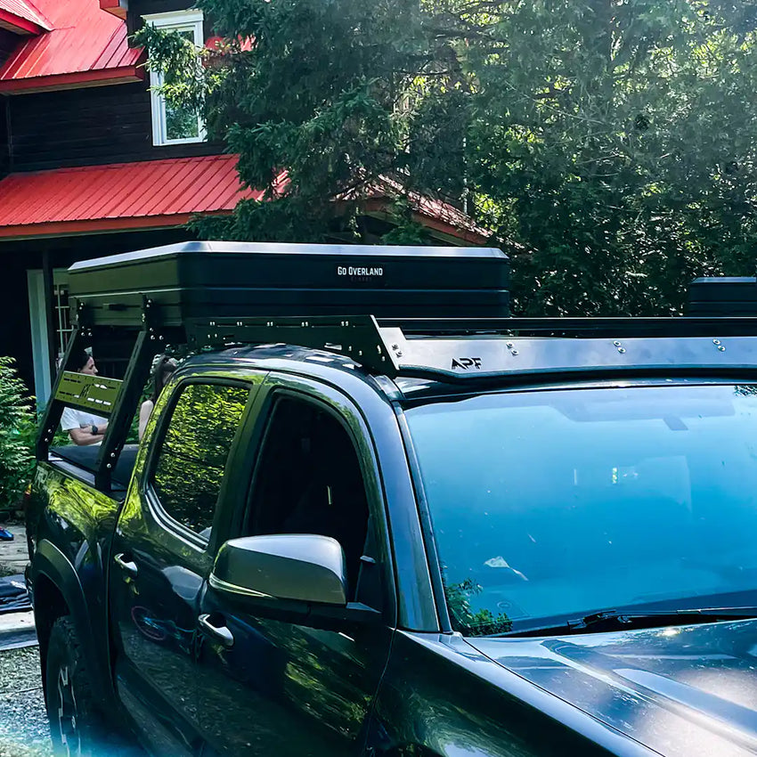 Front view with overland setup, roof tent and tacoma